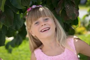 a girl in a pink dress