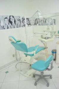 a dental chair in a room