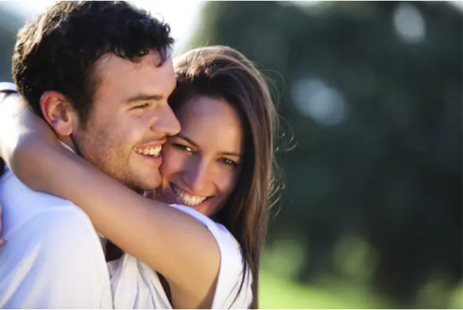 a man and woman hugging