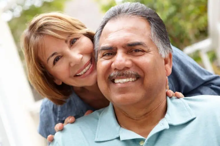 a woman hugging a man