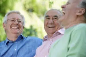 a group of older people laughing