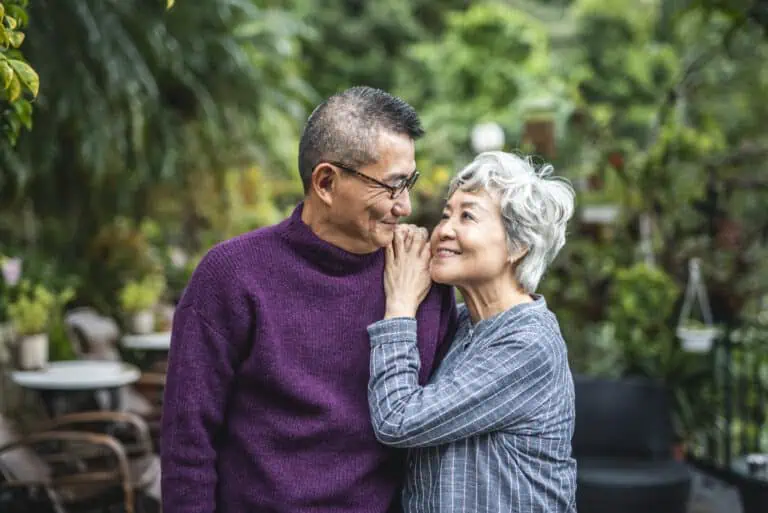 a man and woman smiling