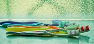 a group of toothbrushes on a table