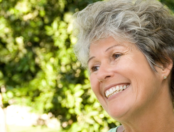 a close-up of a woman smiling