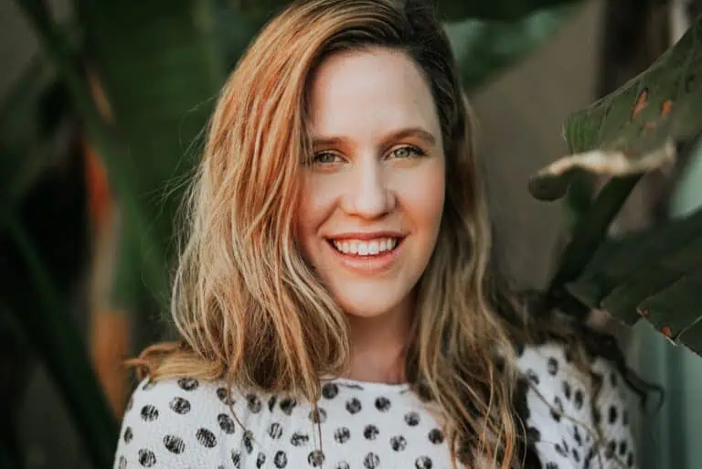 a woman smiling at camera