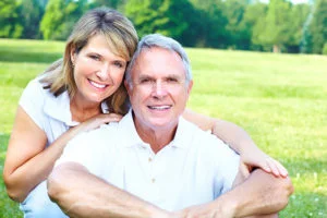 a man and woman hugging each other