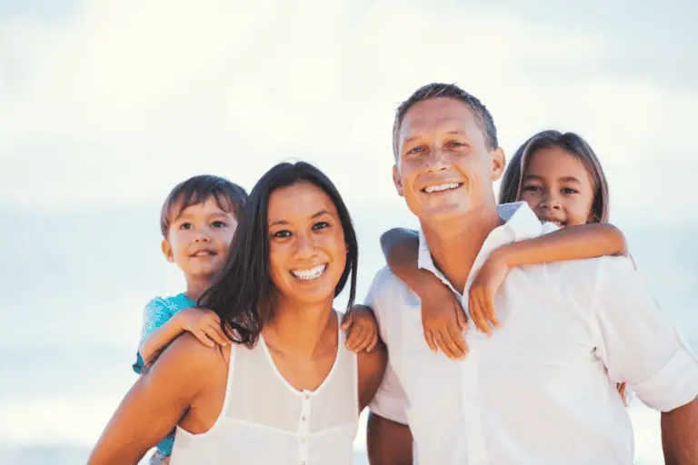 a man and woman with children