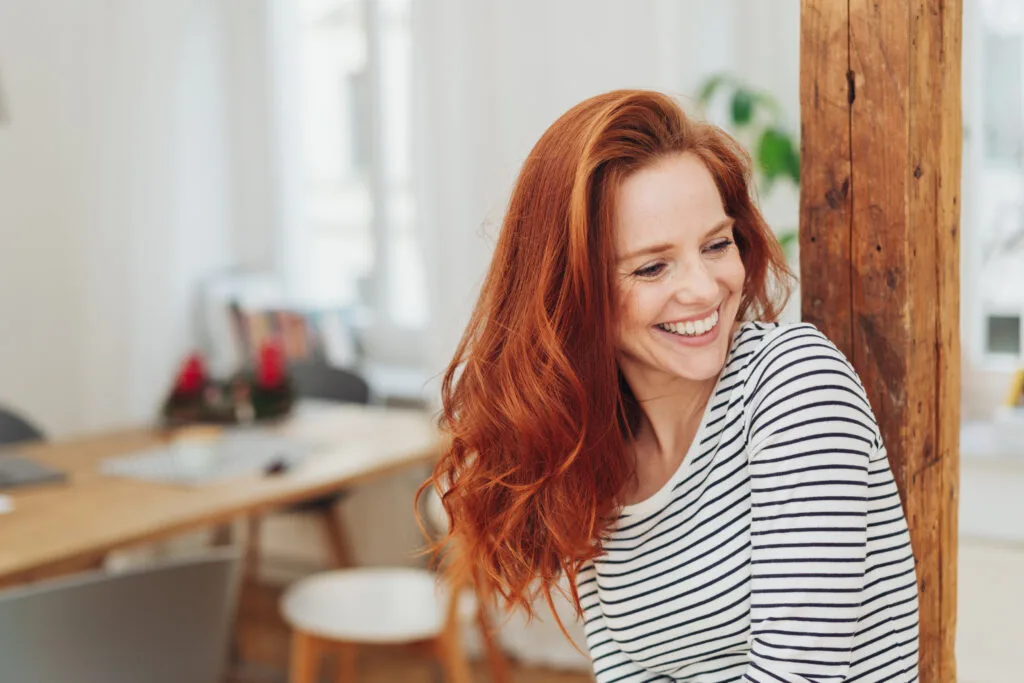 a woman smiling at the camera