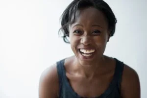 a close-up of a woman smiling