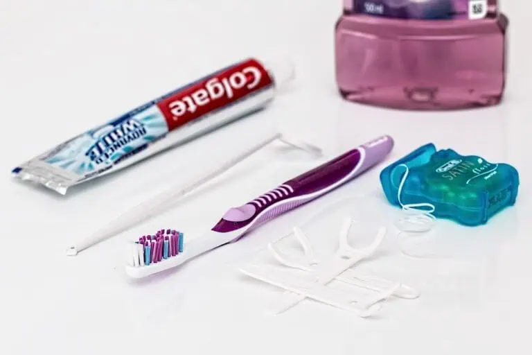 a toothbrush and toothpaste next to a toothbrush